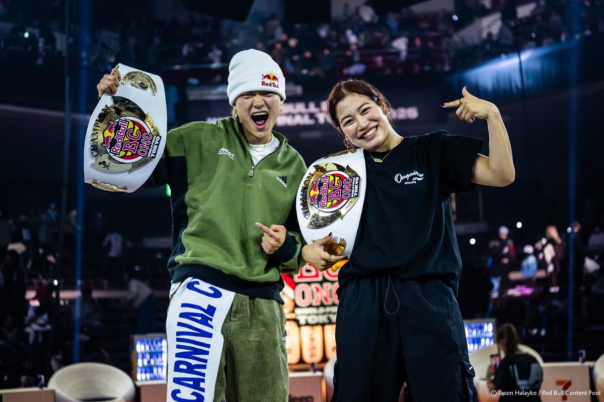 B-girl Riko & B-boy Issin of Japan celebrates with the winners belt during during the Red Bull BC One World Final at Ryogoku Kokugikan Sumo Arena, Tokyo, Japan on November 9, 2025. // Jason Halayko / Red Bull Content Pool // SI202511090340 // Usage for editorial use only //